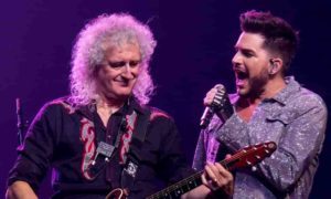 Queen en concierto bajo una lluvia torrencial